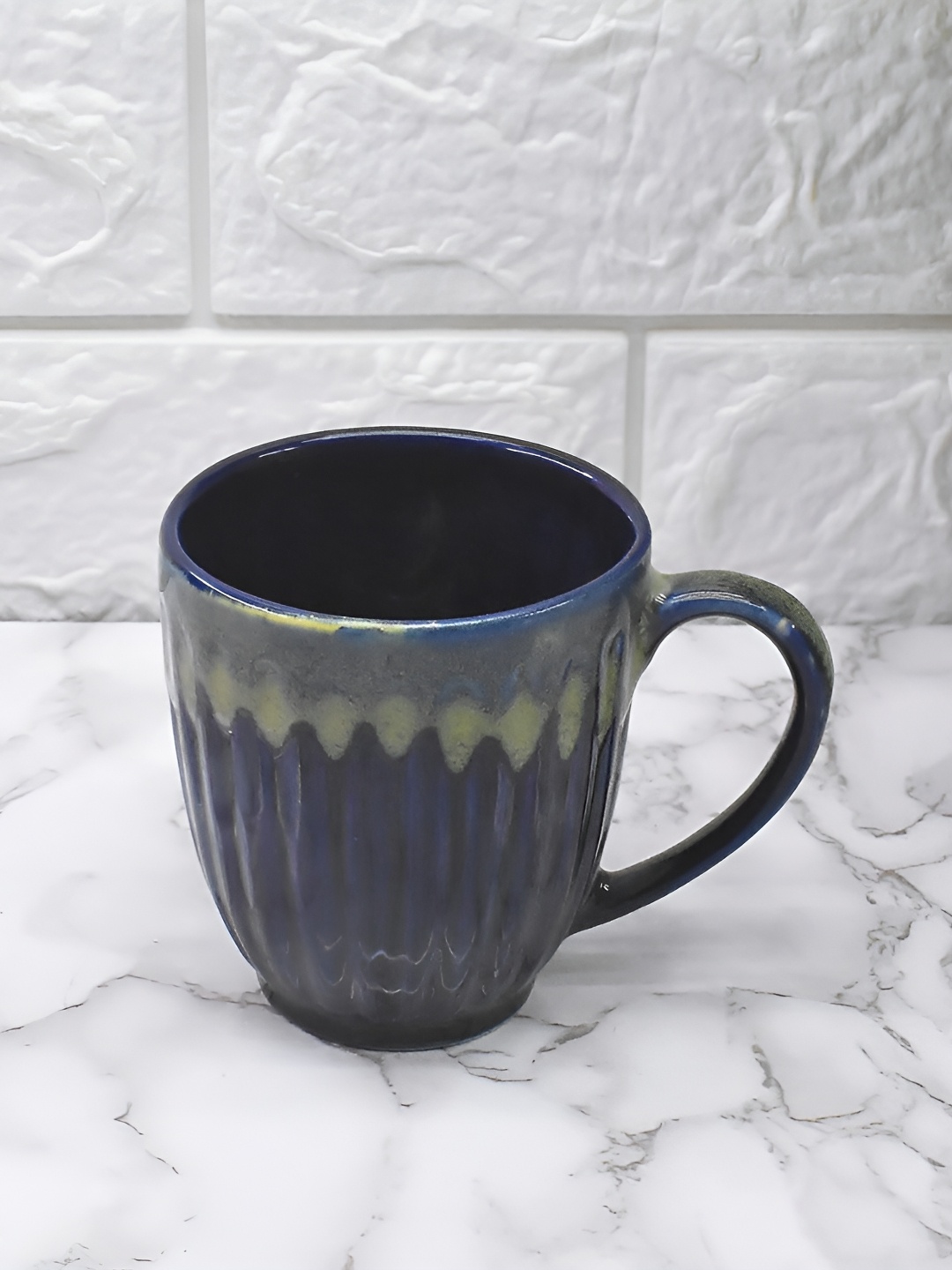 

Kookee Blue and Yellow Printed Ceramic Mugs 350 ml