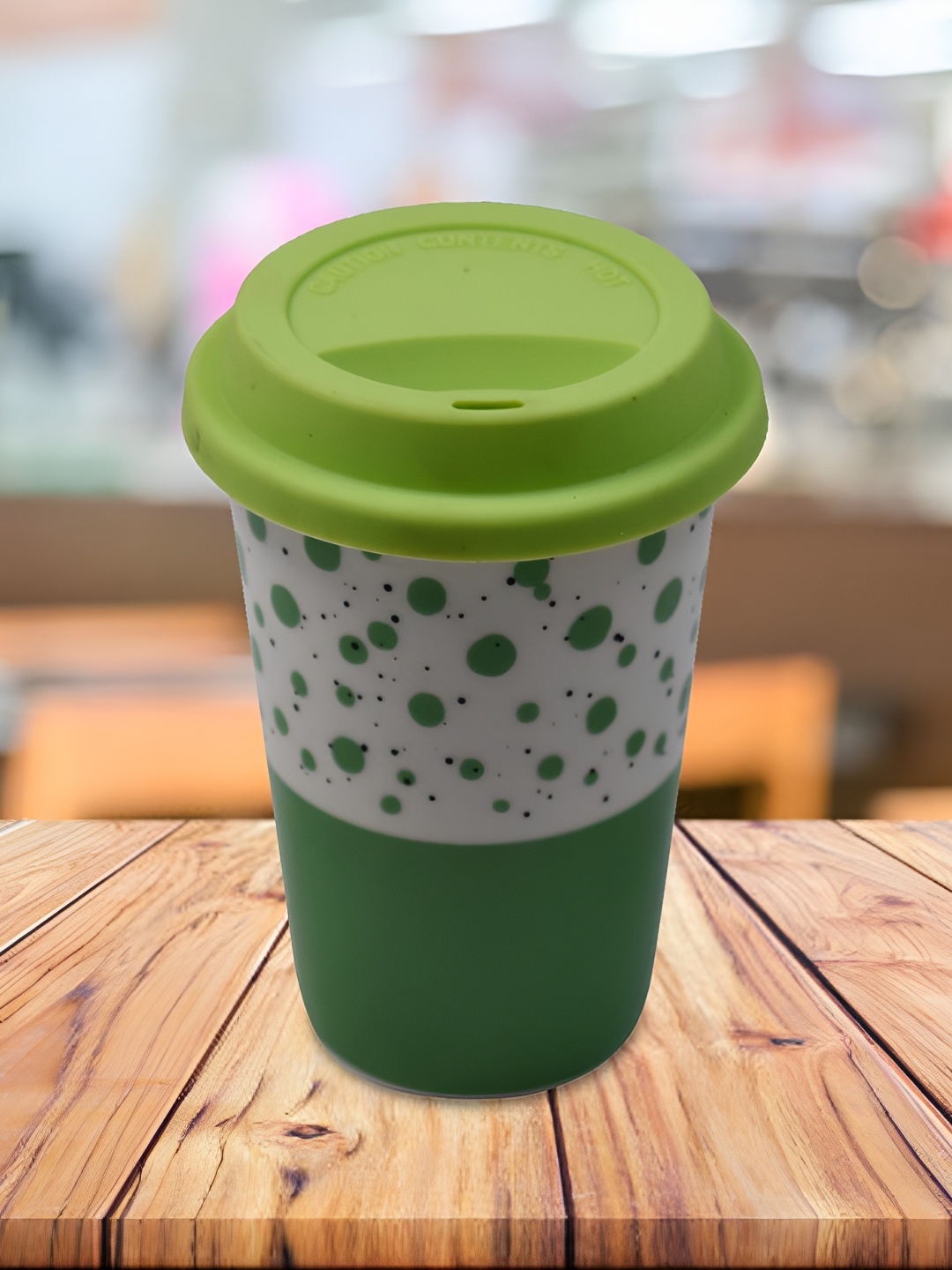 

Kookee Green & White Printed Ceramic Matte Tumbler With Silicone Lid 275 ml