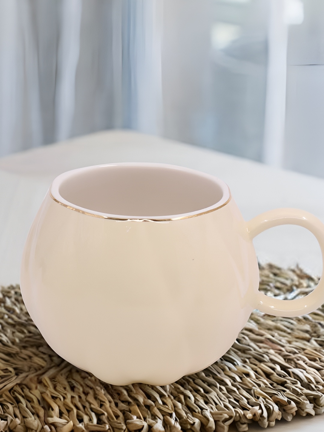 

Kookee Beige & Gold Toned Printed Glossy Ceramic Mug 250 ml