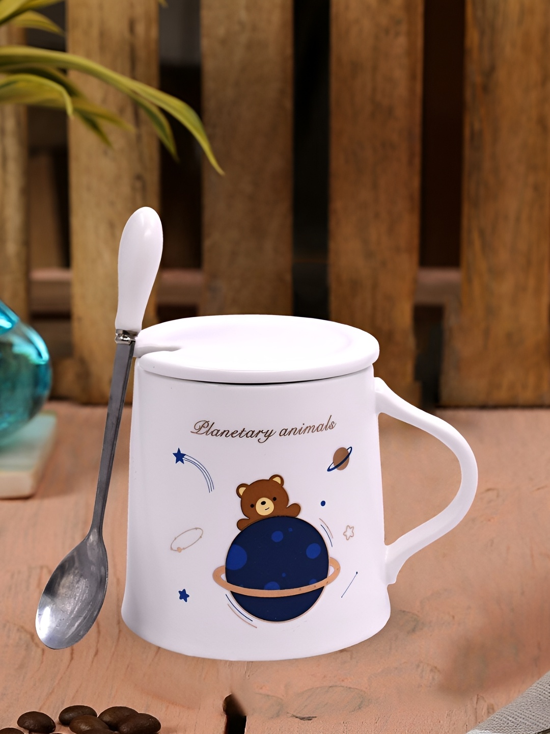 

Kookee White Printed Fancy Ceramic Mugs with Lid and Spoon 250 ml