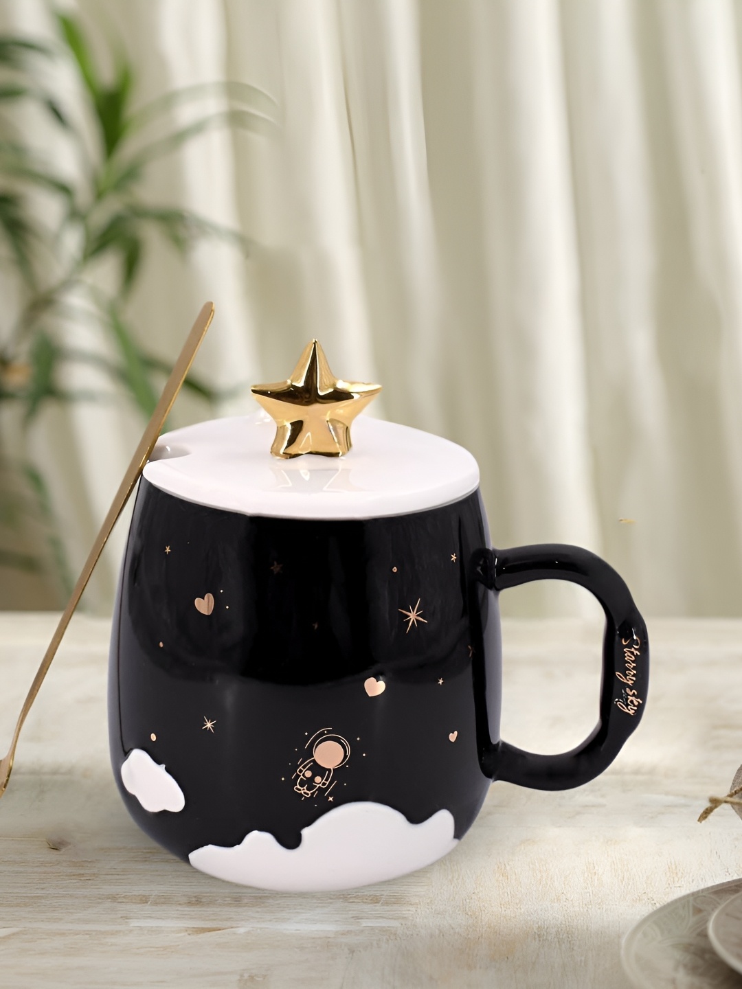 

Kookee Black & White Printed Ceramic Mug With Lid & Handle & Spoon 325 ML