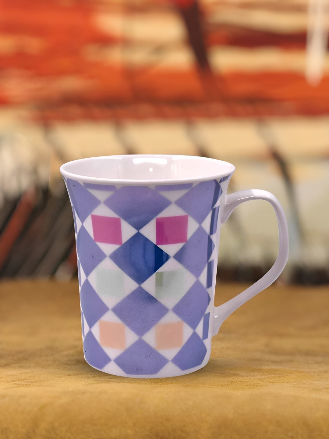 

Kookee Blue & White Printed Ceramic Glossy Mug 325 ML