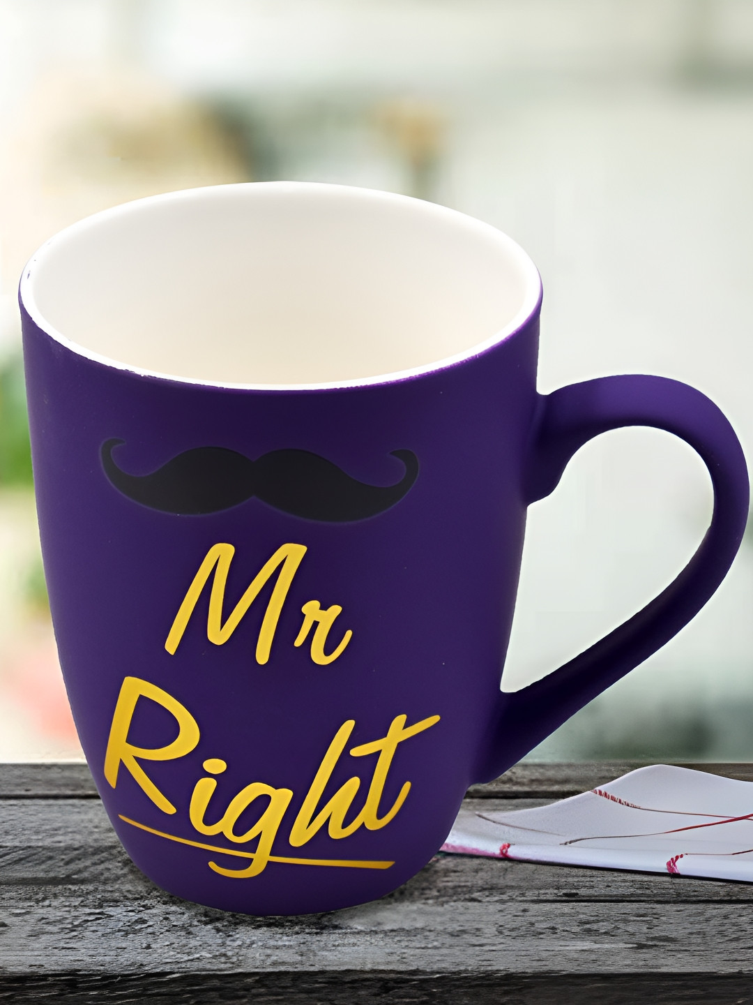 

Kookee Purple & Yellow Printed Ceramic Glossy Mug 325 ML