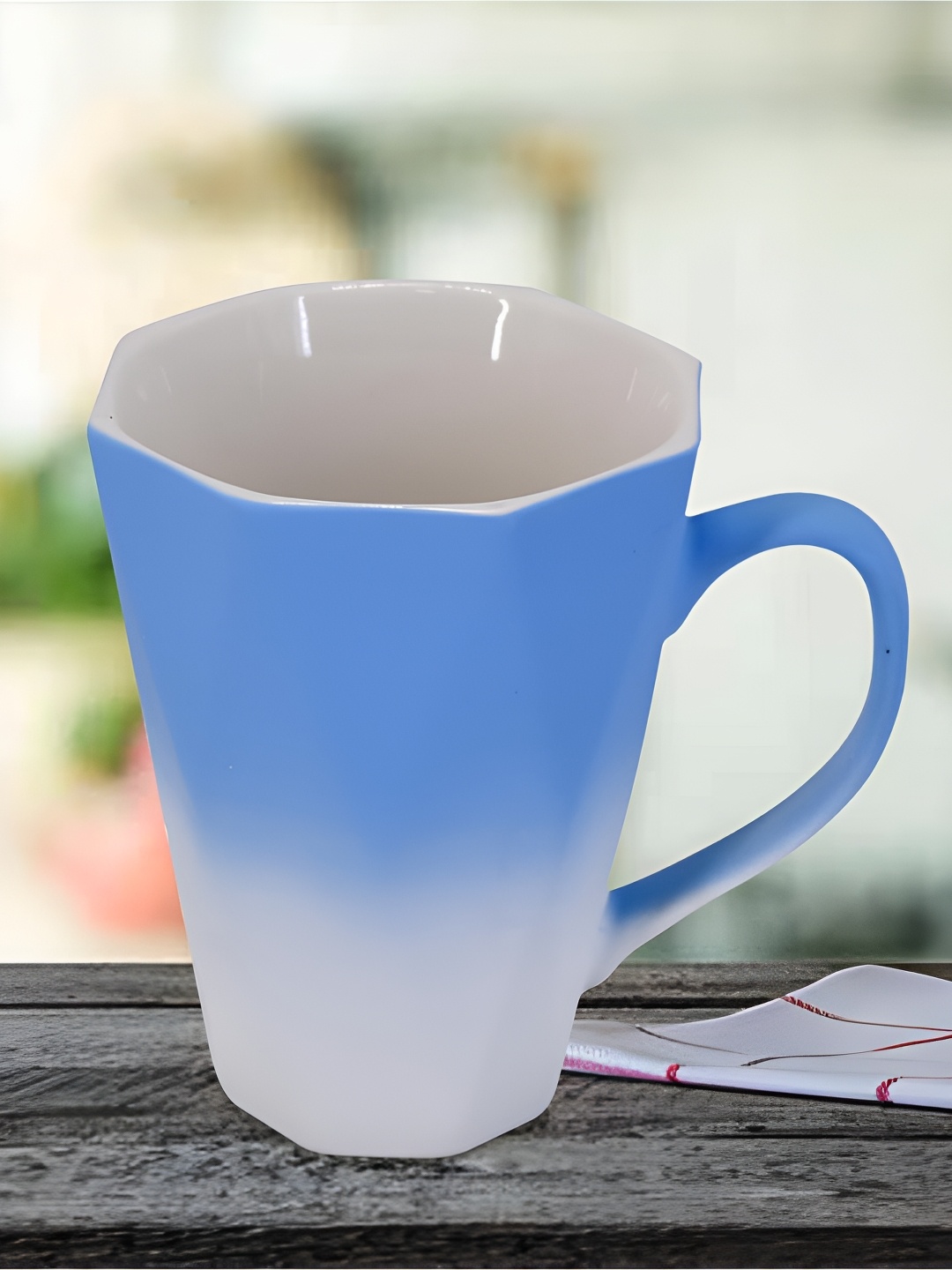 

Kookee Blue & White Colourblocked Ceramic Glossy Mug 325 ML