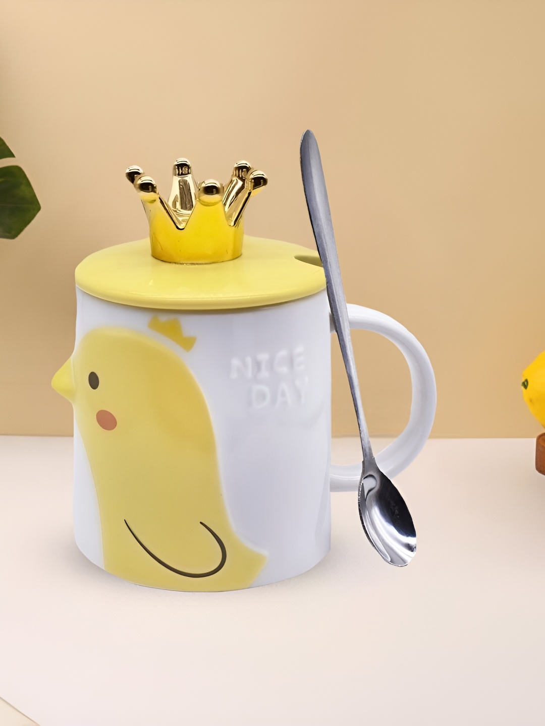 

Kookee Yellow & White Printed Ceramic Mug With Lid & Handle & Spoon 350 ML