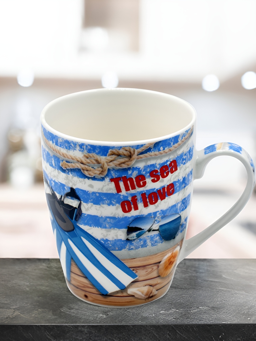 

Kookee White & Blue Printed Ceramic Mug 325 ML