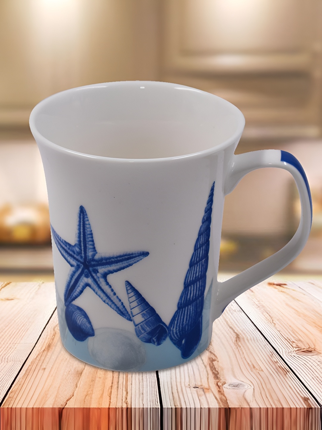 

Kookee White & Blue Printed Ceramic Glossy Mug 325 ml