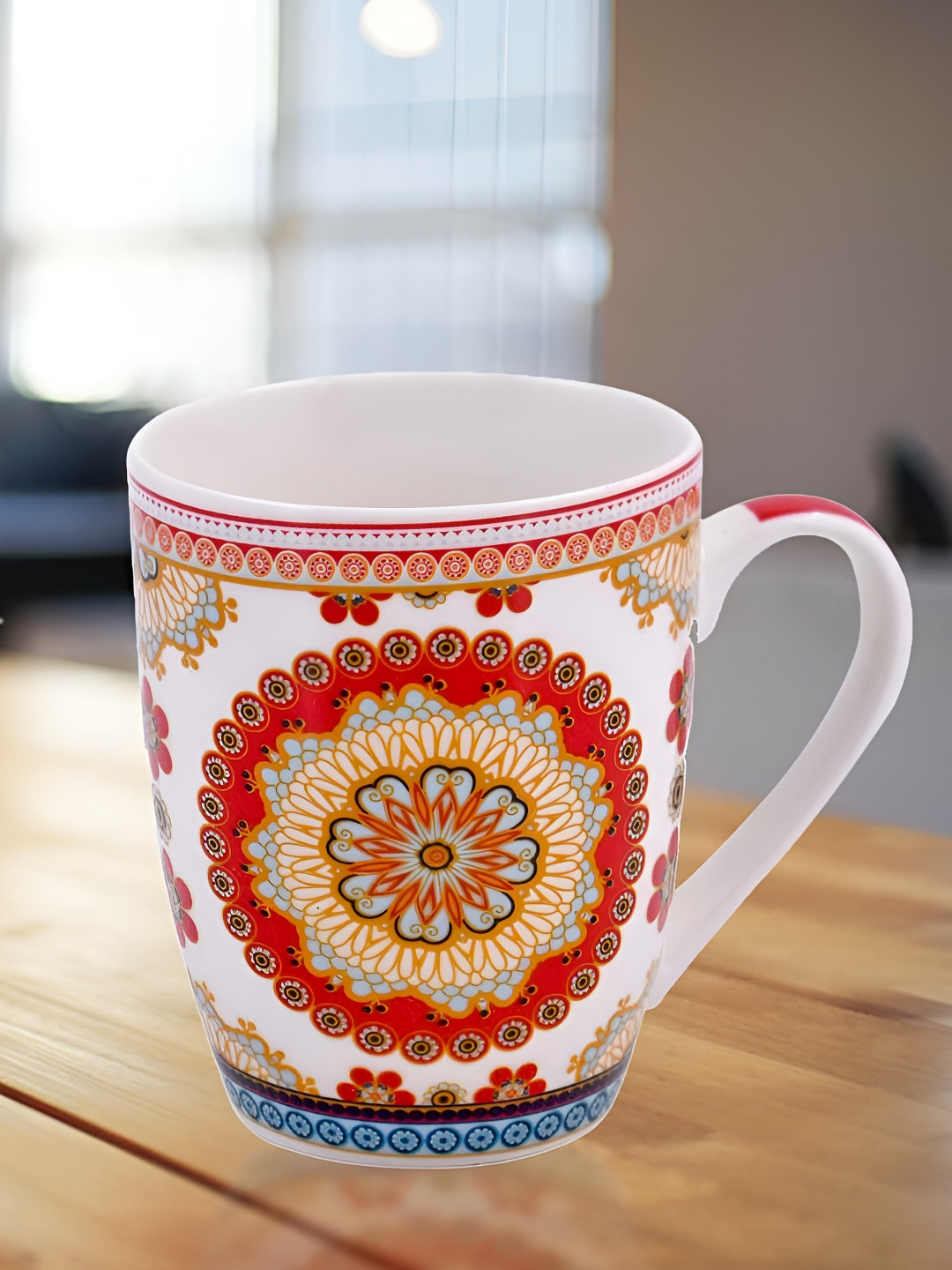 

Kookee Red & Yellow Printed Ceramic Mug 325 ML