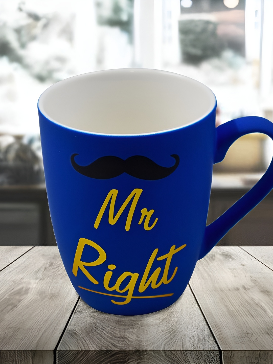 

Kookee Blue & Black Printed Printed Ceramic Mug 325 ML