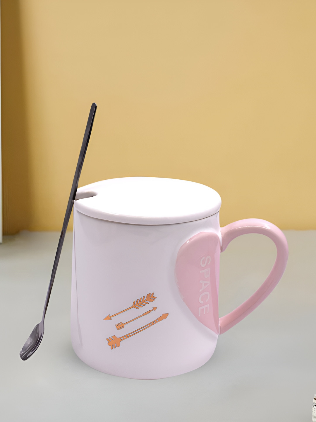 

Kookee White & Orange Printed Ceramic Mug With Lid & Handle & Spoon 325 ML