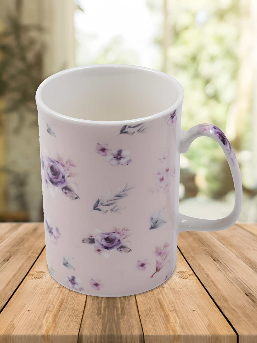 

Kookee Pink & Blue Printed Ceramic Mug 325 ML