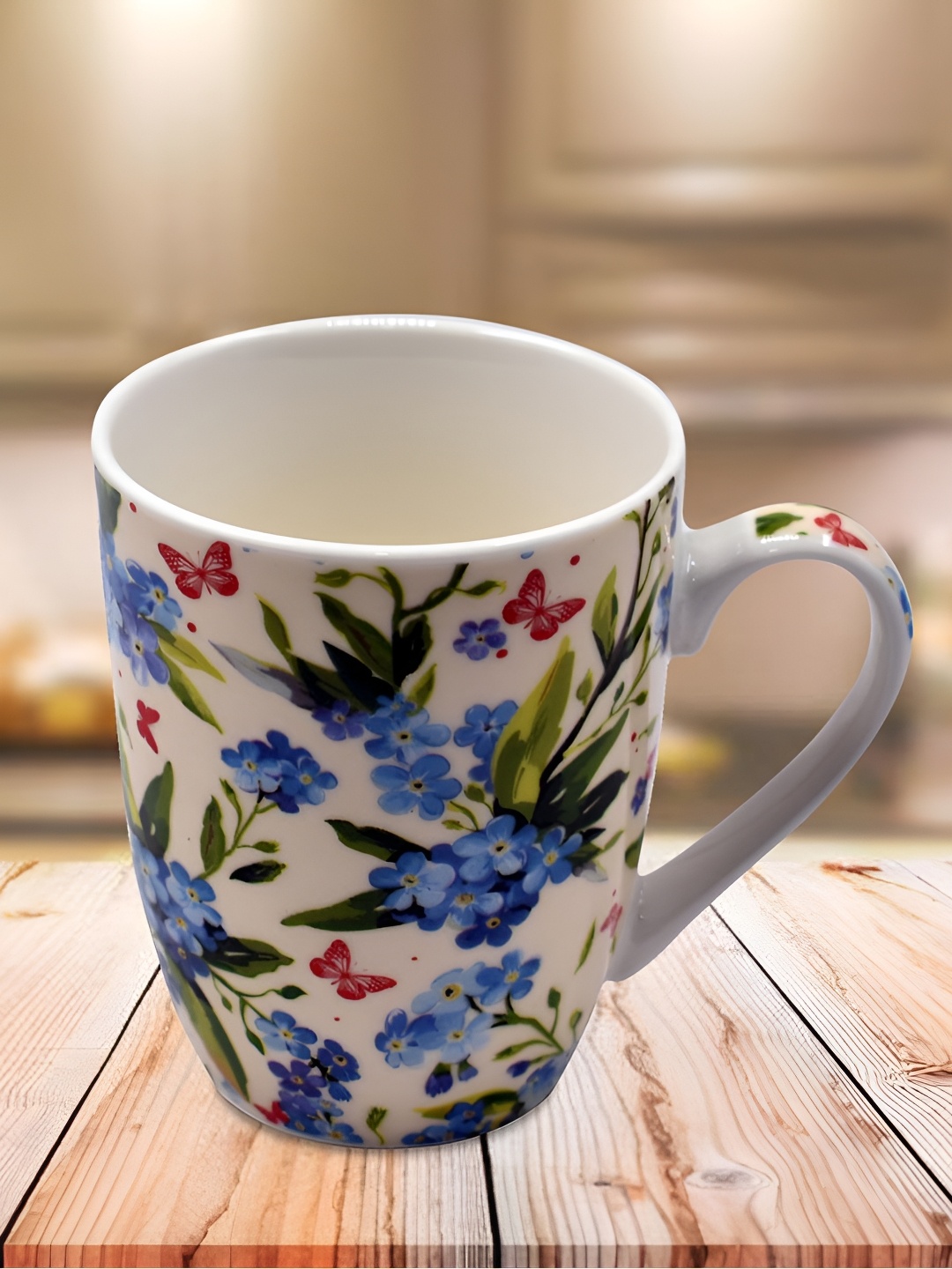 

Kookee Green & Blue Printed Ceramic Mug 325 ML