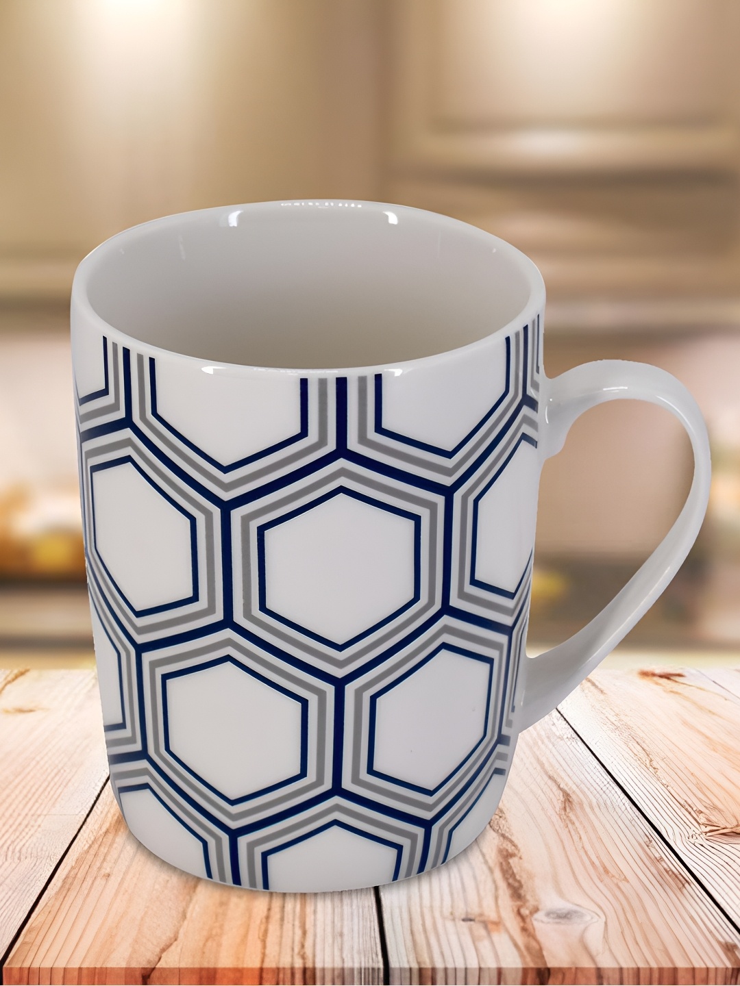 

Kookee White & Navy Blue Geometric Printed Ceramic Glossy Mug 325 ml