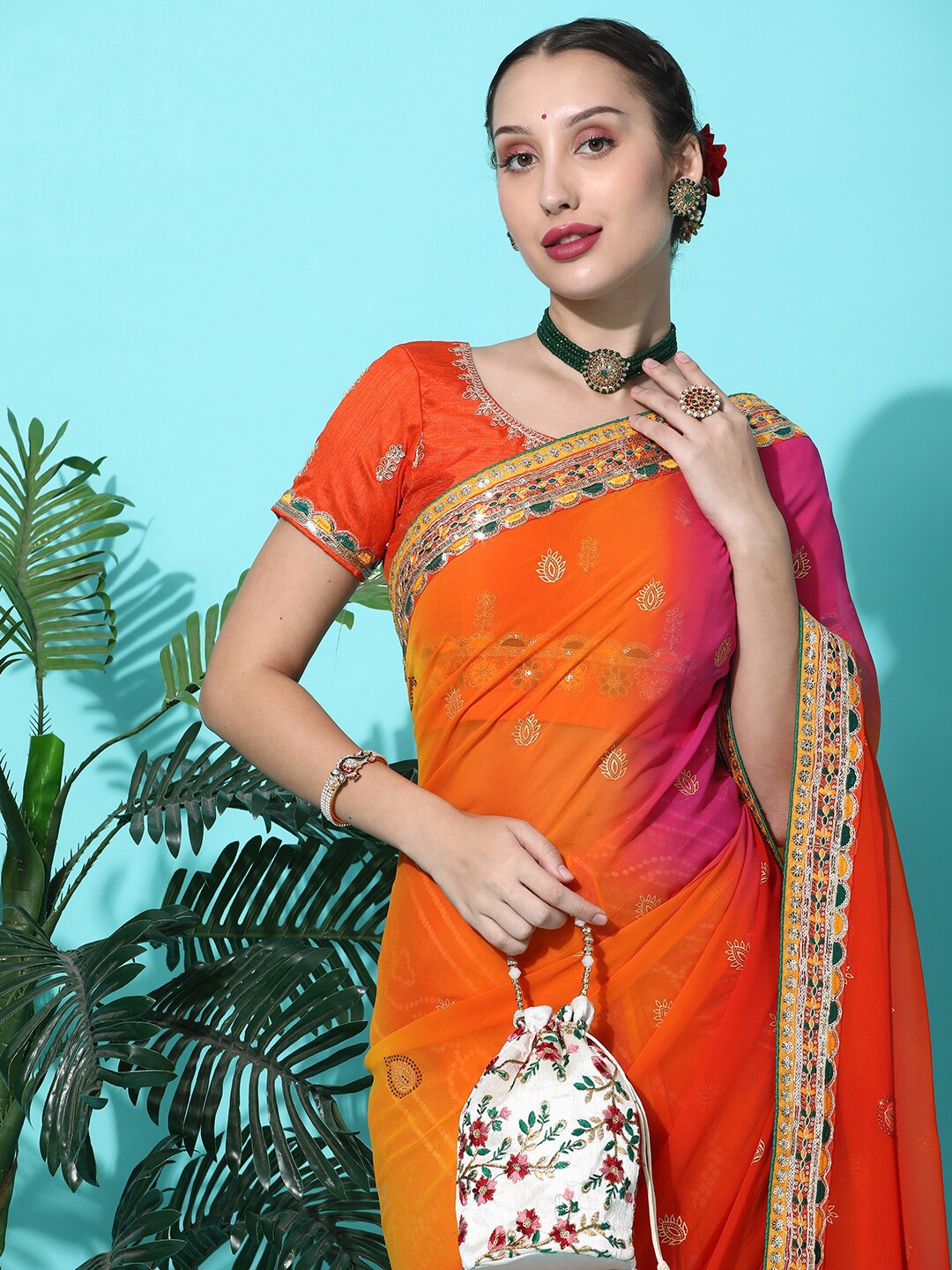 

KAVINDI Bandhani Printed Pure Georgette Half and Half Bandhani Saree, Orange