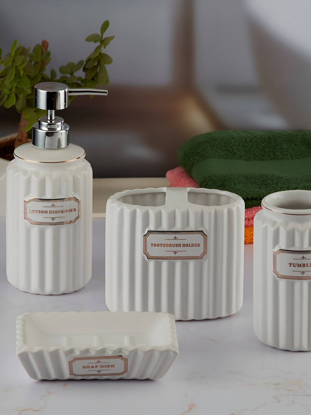 

Kookee White & Silver Toned 4 Pieces Textured Ceramic Bath Accessories Set