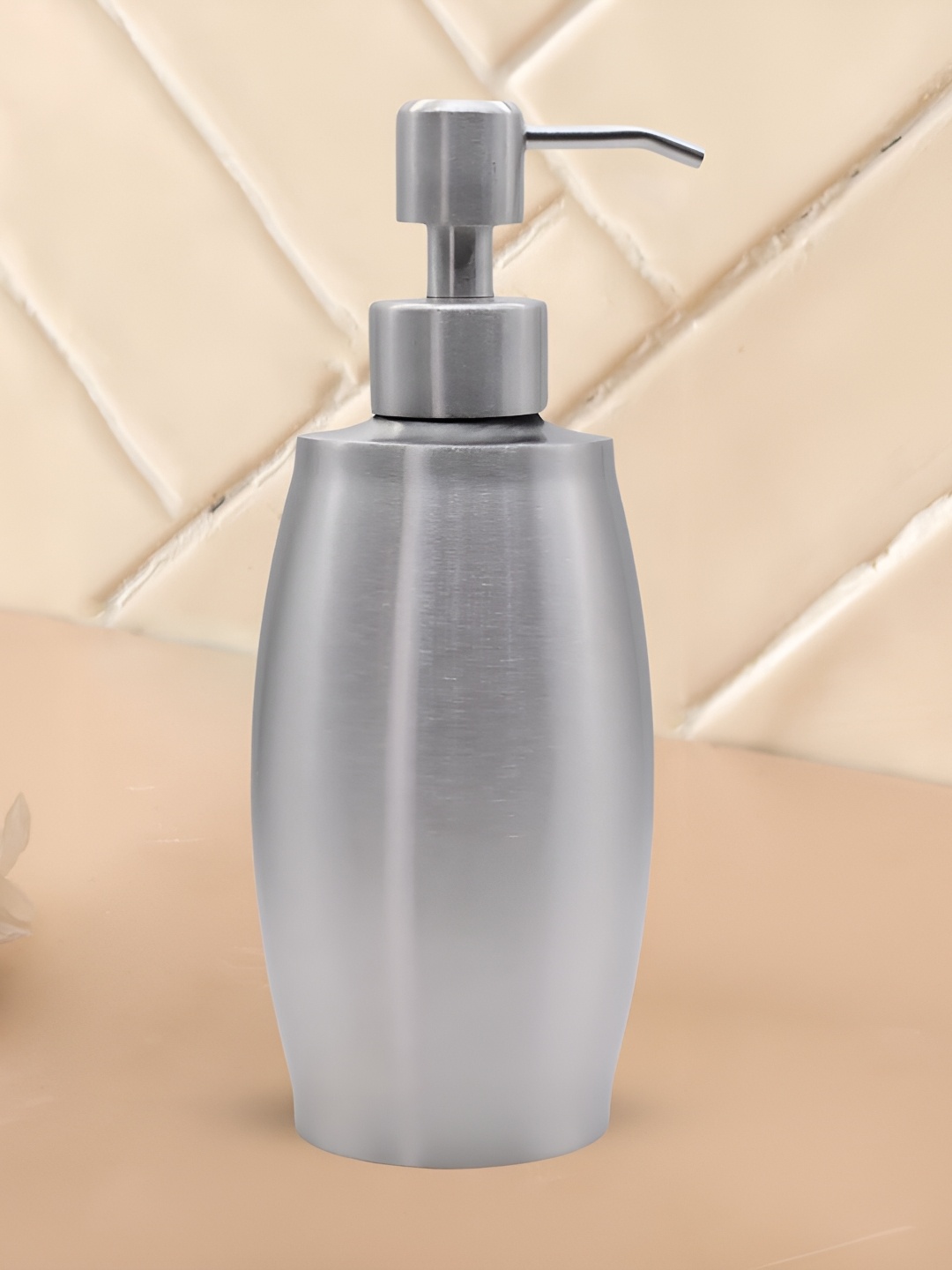 

Kookee Silver Toned Abstract Stainless Steel Soap Dispenser