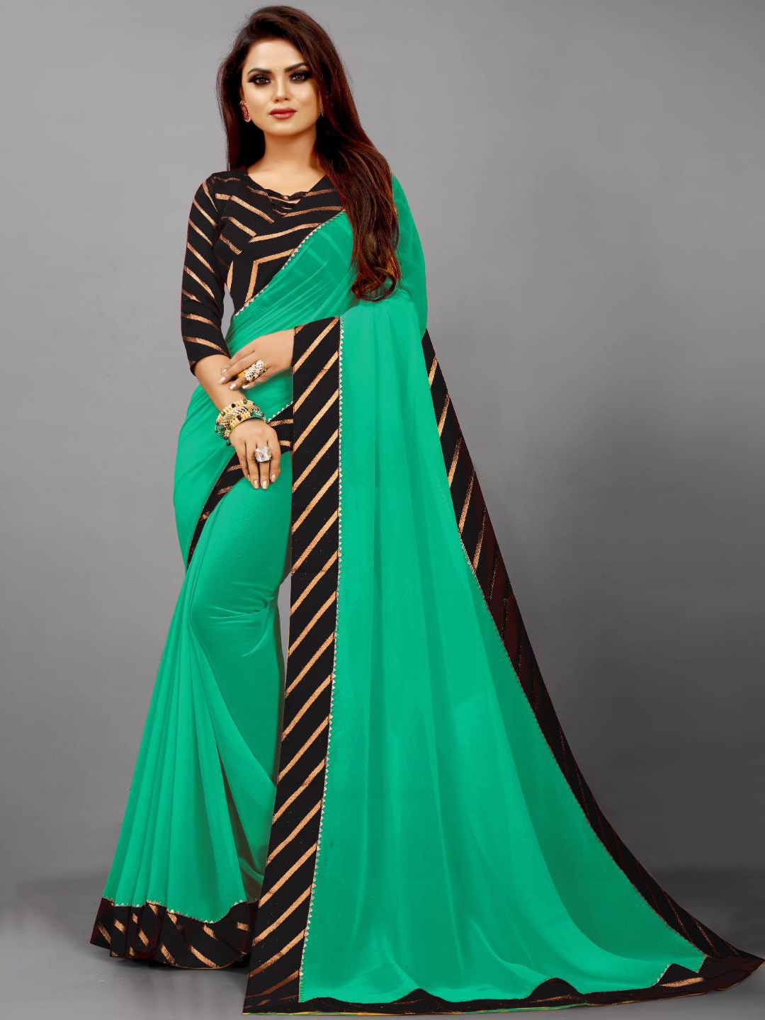 

SM TRENDZ Embellished Pure Georgette Saree, Sea green