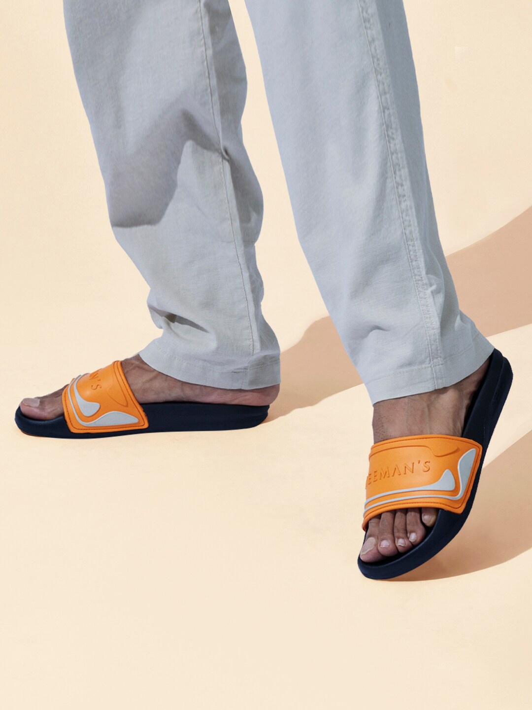 

NEEMANS Men Printed Sliders, Orange