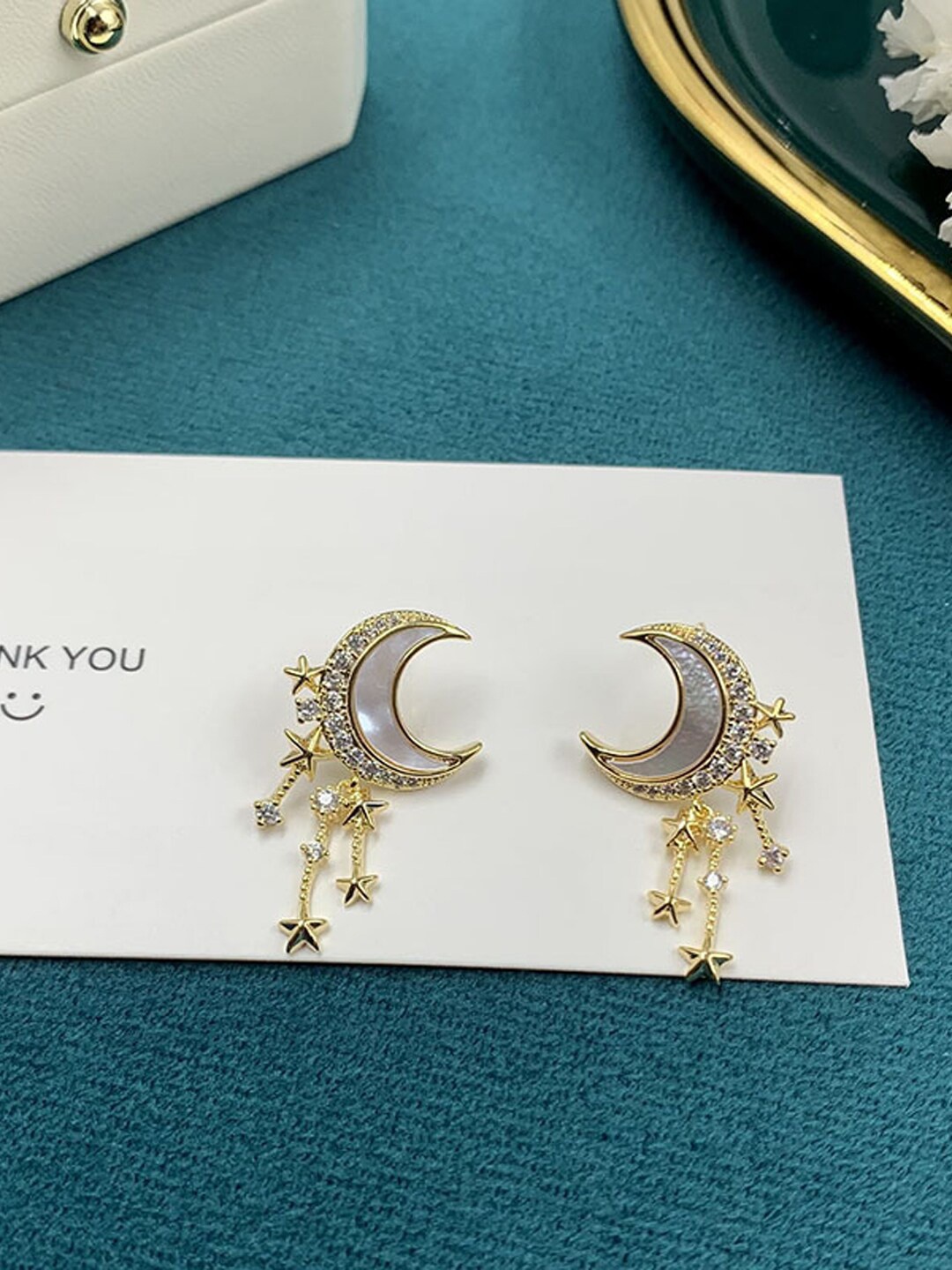 

VAGHBHATT Gold Plated Crescent Shaped Charm Crystal Studs Earrings