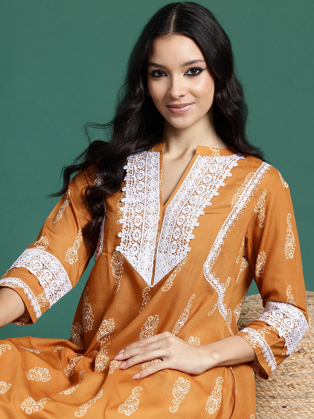

Sangria Ethnic Motifs Printed Lace Inserted Kurta, Mustard