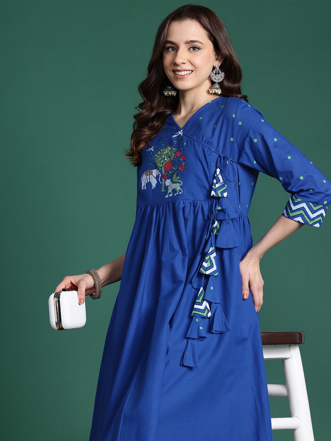 

Sangria Ethnic Motifs Printed Tie-Up Angrakha Kurta & Trousers, Navy blue