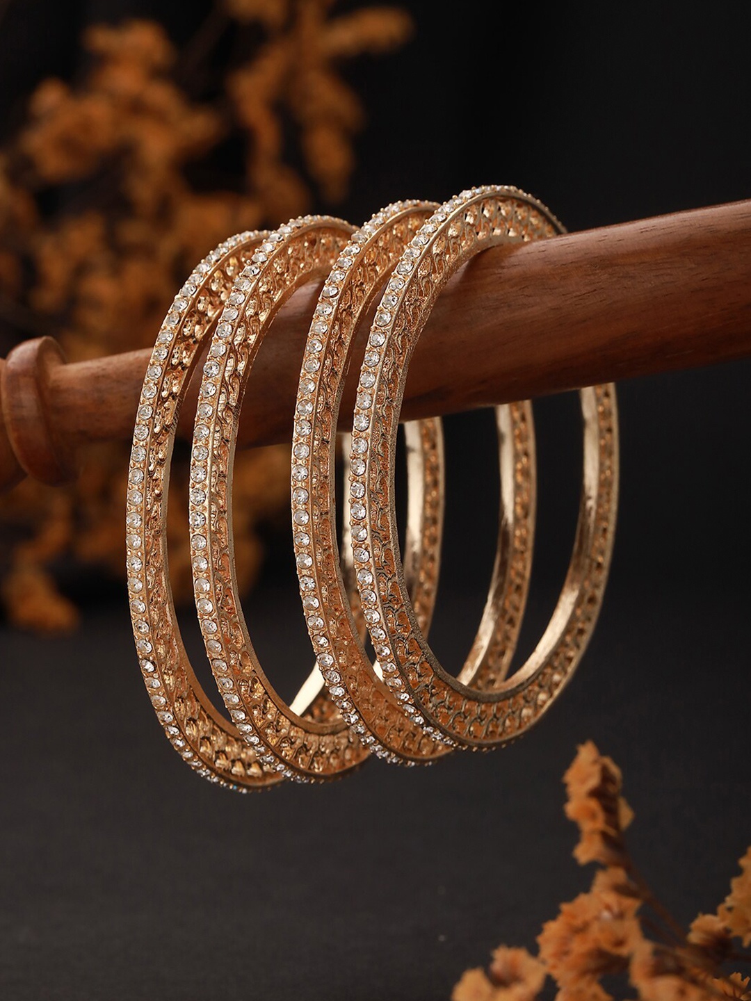 

Jazz and Sizzle Set Of 4 Gold-Plated CZ-Studded Bangles