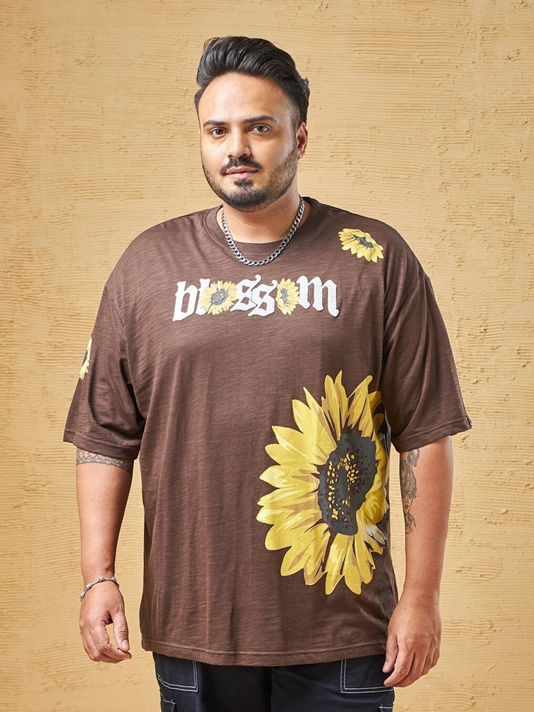 

Bewakoof AIR Printed V-Neck Pure Cotton Raw Edge Oversized Plus Size T-shirt, Brown