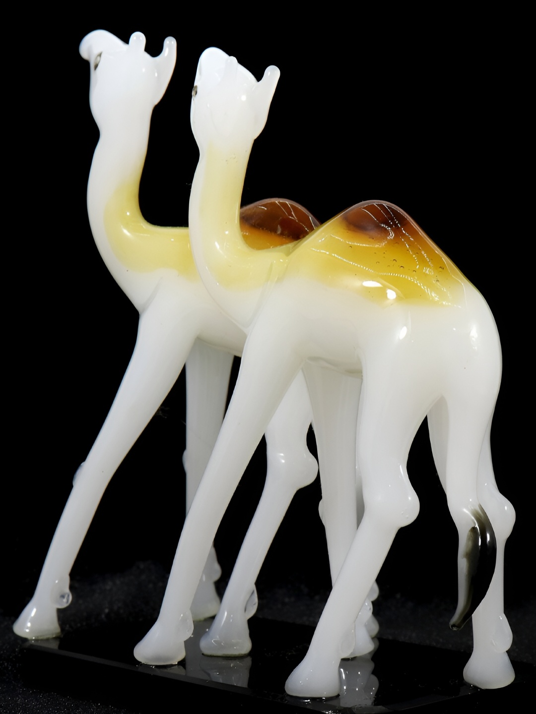 

NMII Brown & White Camel Pair Figurine Showpiece