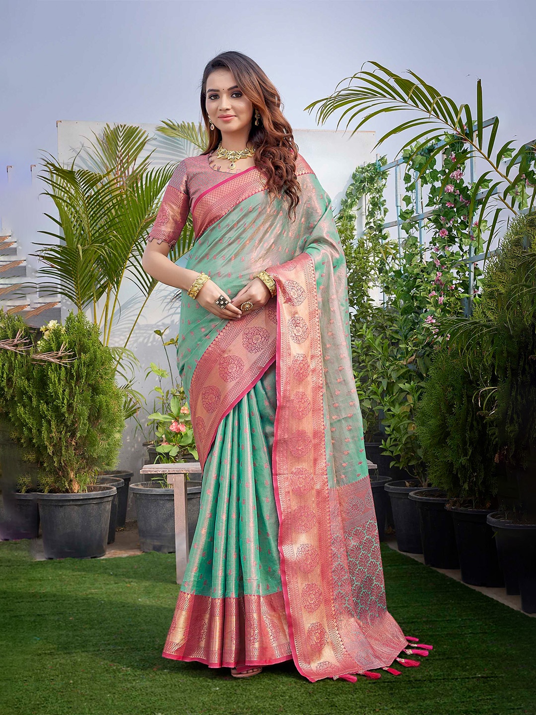 

Mitera Green & Pink Ethnic Motifs Woven Design Zari Banarasi Saree