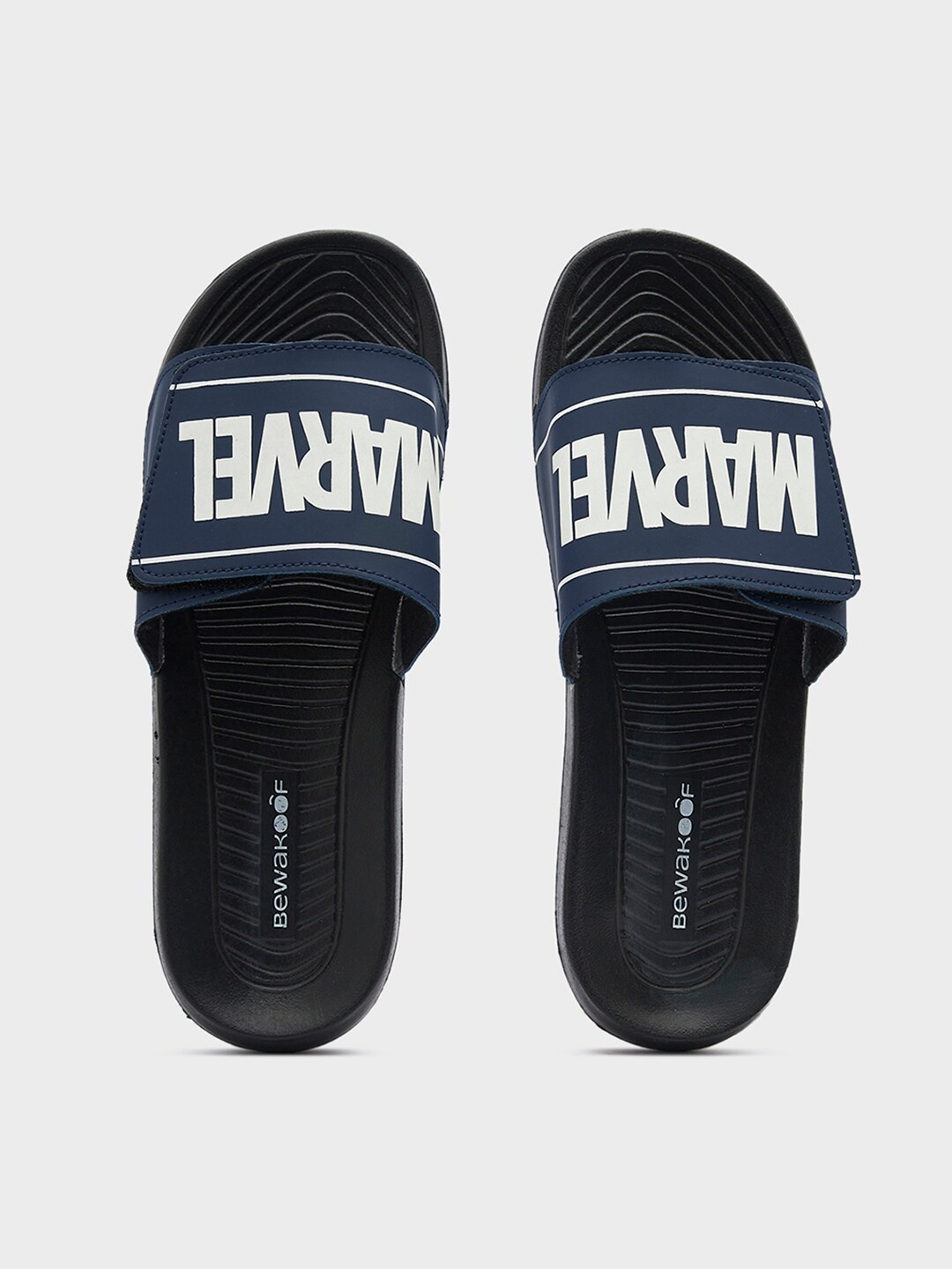 

Bewakoof Men Marvel Printed Rubber Sliders, Black
