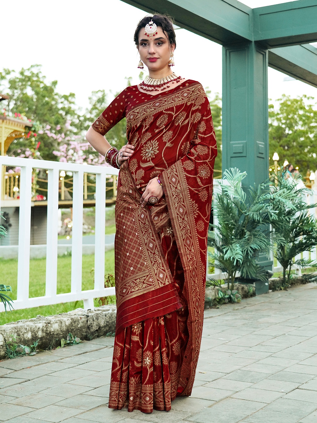 

Anouk Maroon & Gold Toned Woven Design Floral Zari Organza Saree