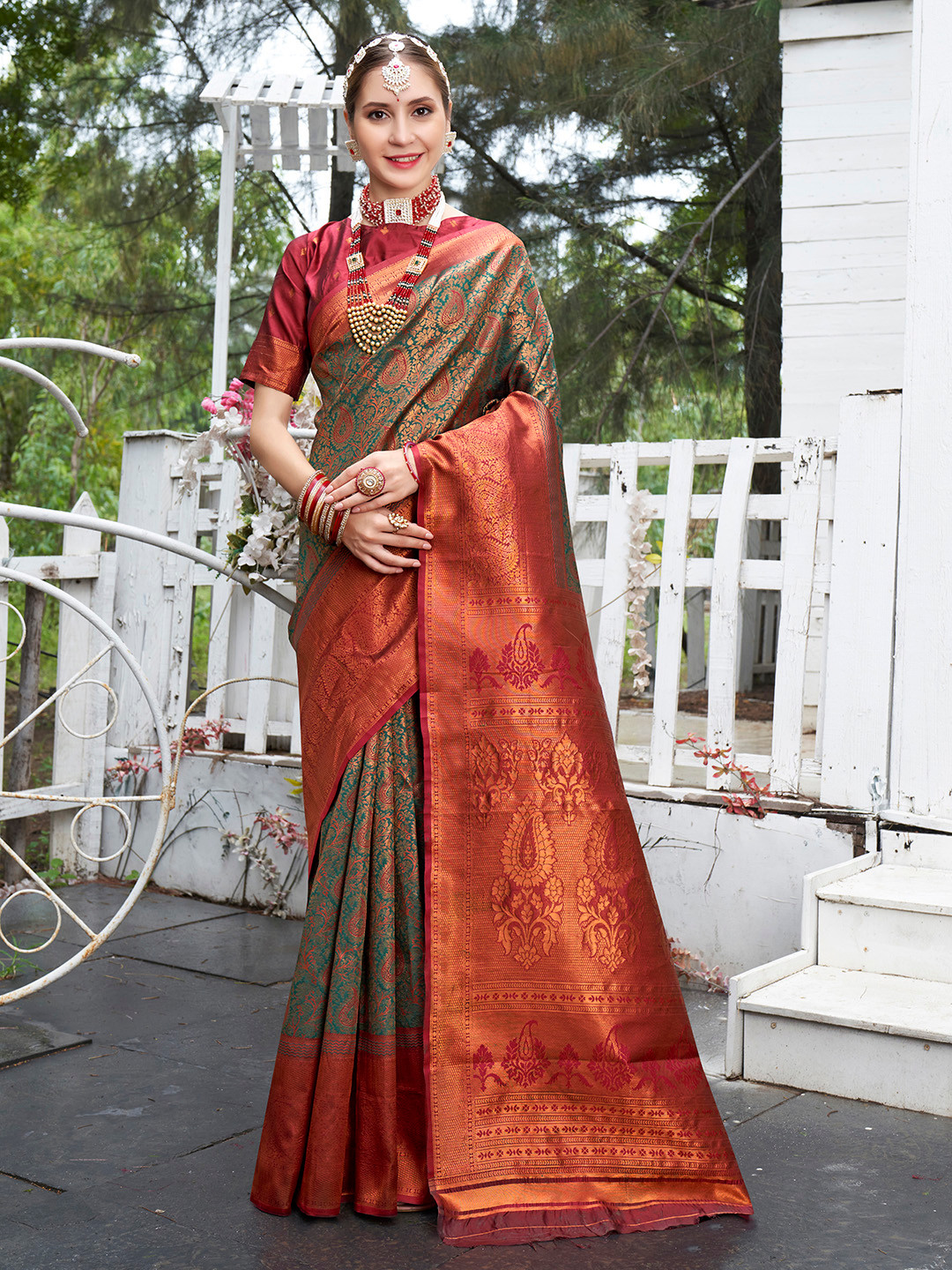 

Anouk Green & Red Woven Design Paisley Art Silk Designer Kanjeevaram Saree