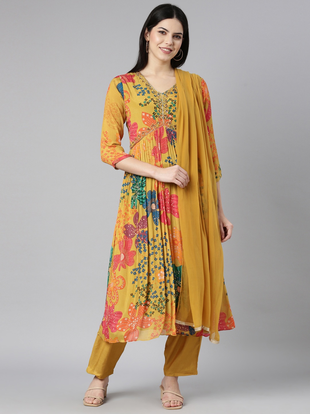 

Neerus Yellow Floral Printed Pleated Sequinned Silk Chiffon Kurta with Trousers & Dupatta, Mustard