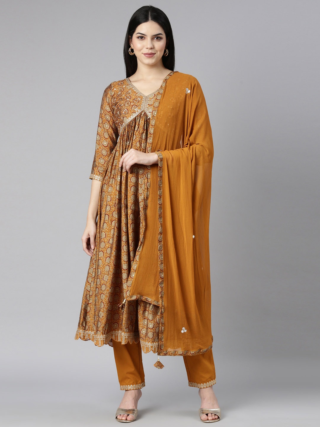

Neerus Floral Printed Pleated Mirror Work Pure Cotton Kurta with Trousers & With Dupatta, Mustard
