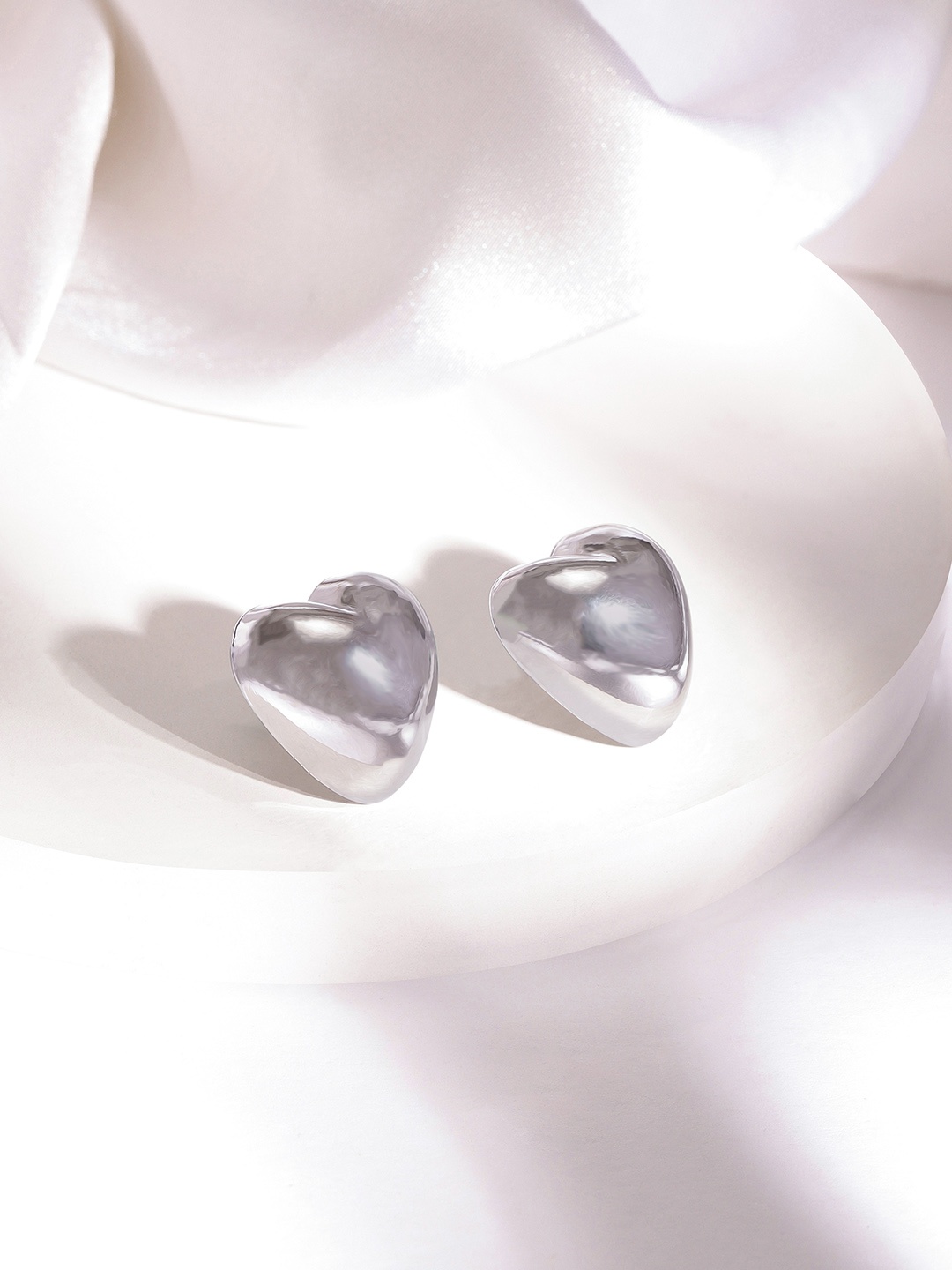 

Rubans Voguish Silver-Plated Heart Shaped Stud Earrings