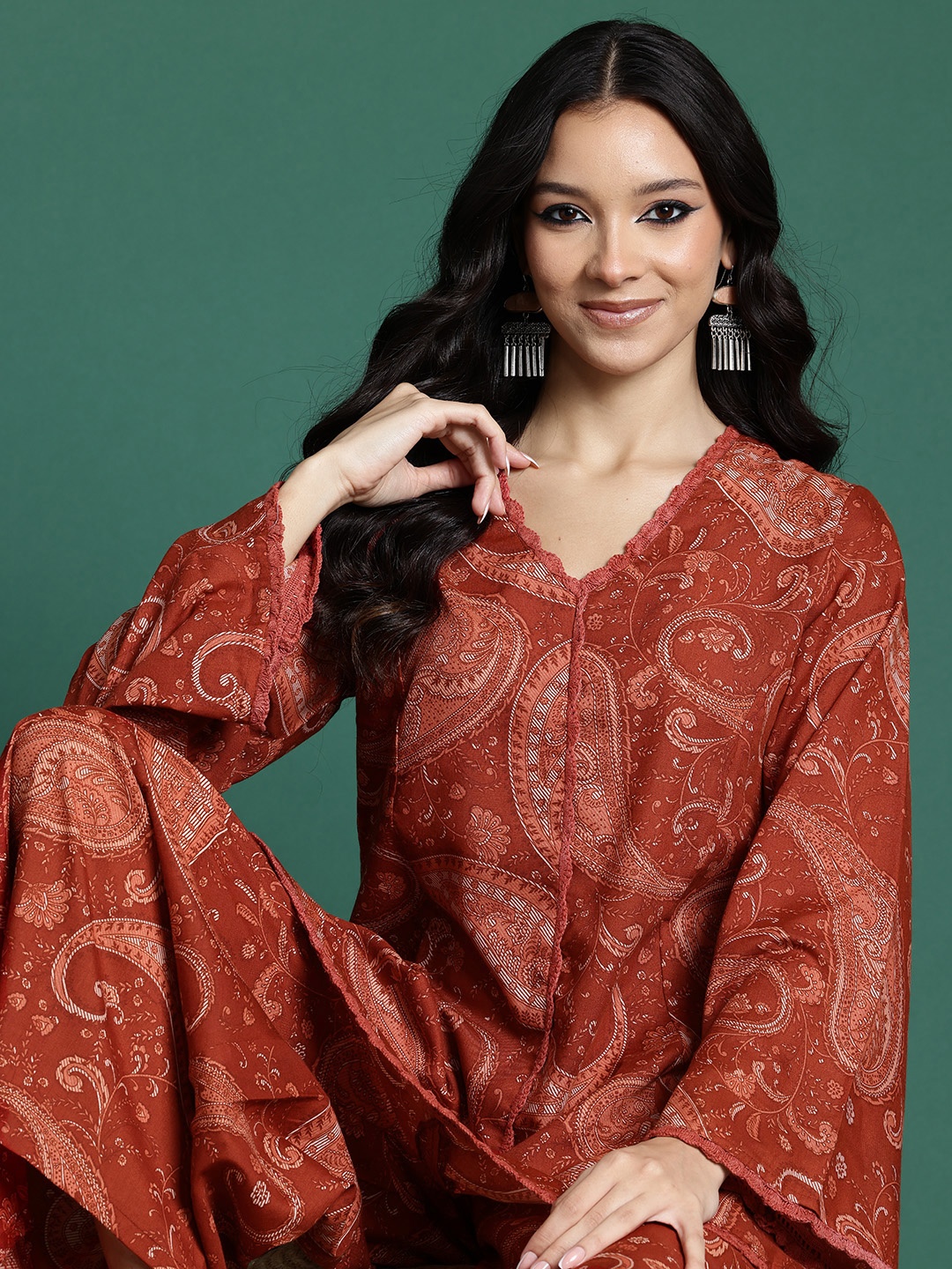 

Sangria Women Ethnic Motifs Printed Kurta with Palazzos, Rust