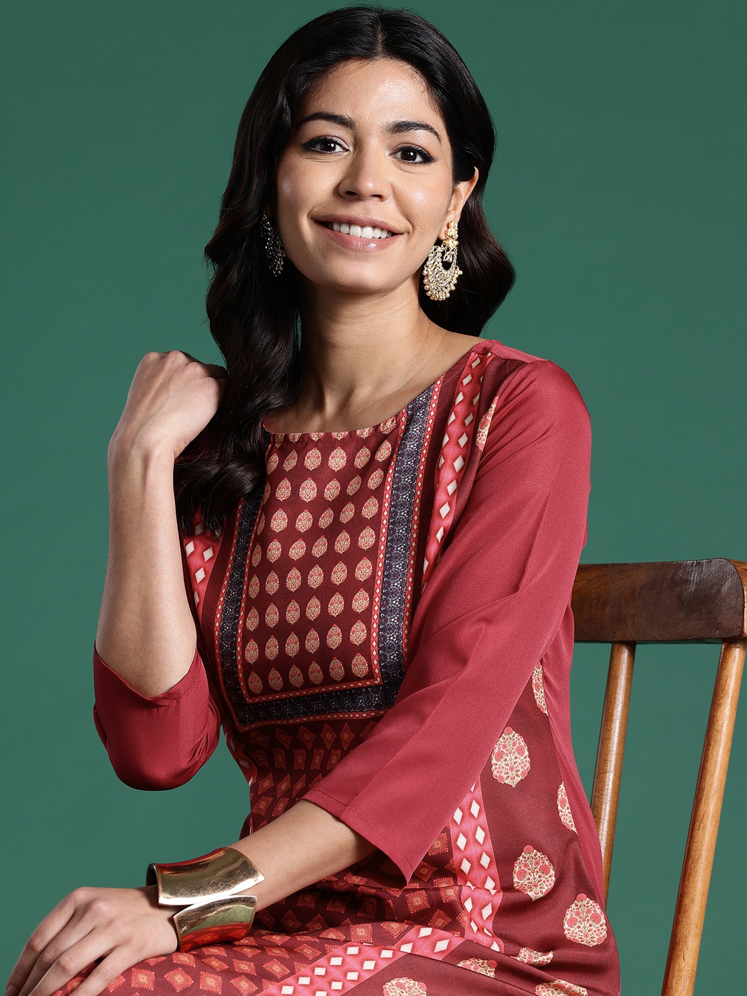 

Sangria Women Ethnic Motifs Printed Kurta with Trousers, Maroon