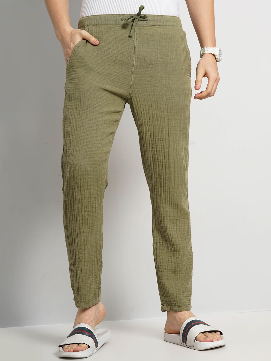 

Celio Men Striped Mid-Rise Plain Cotton Regular Fit Trousers, Green
