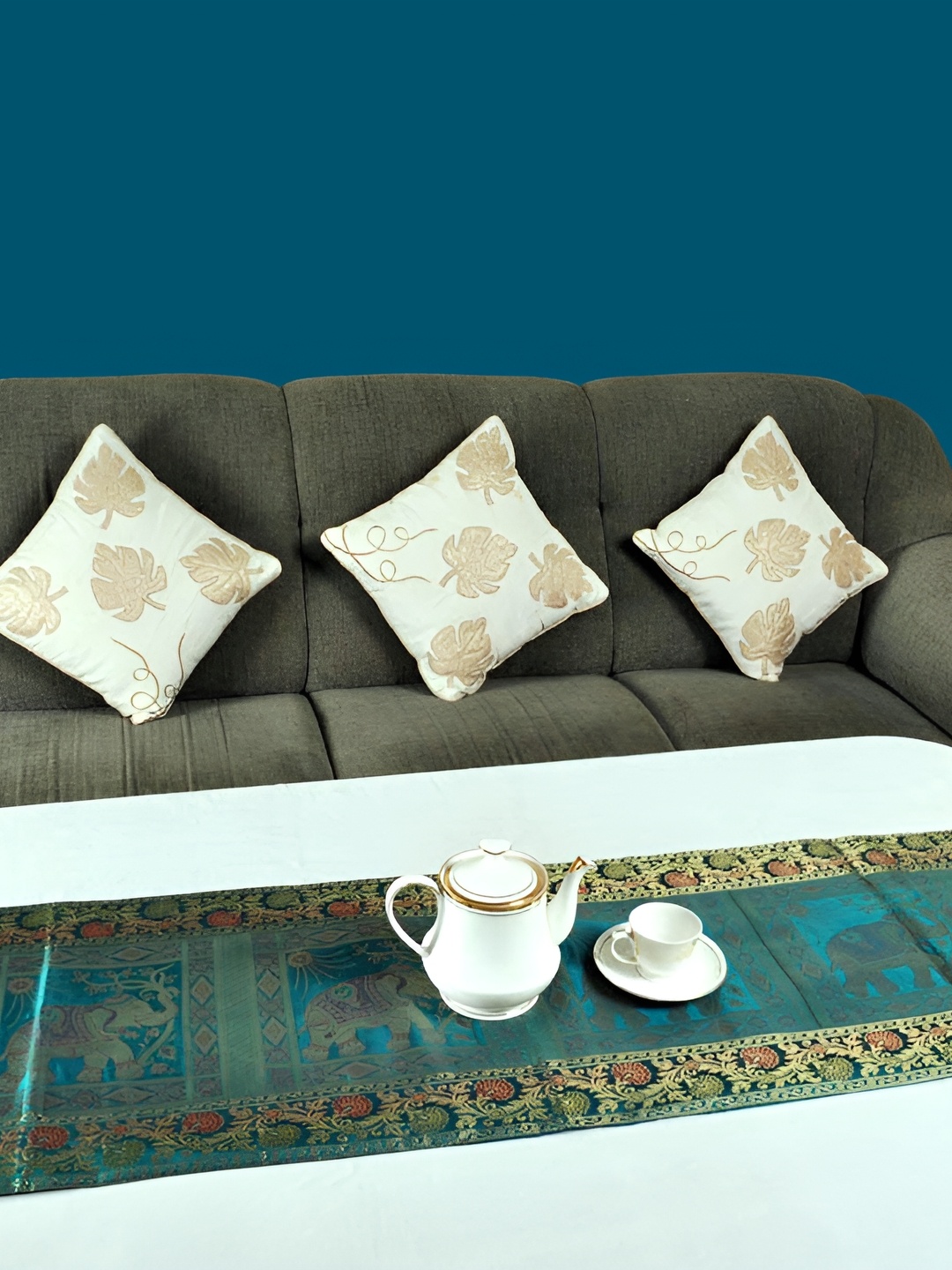 

Lal Haveli Green and GoldToned Woven Design Table Runners