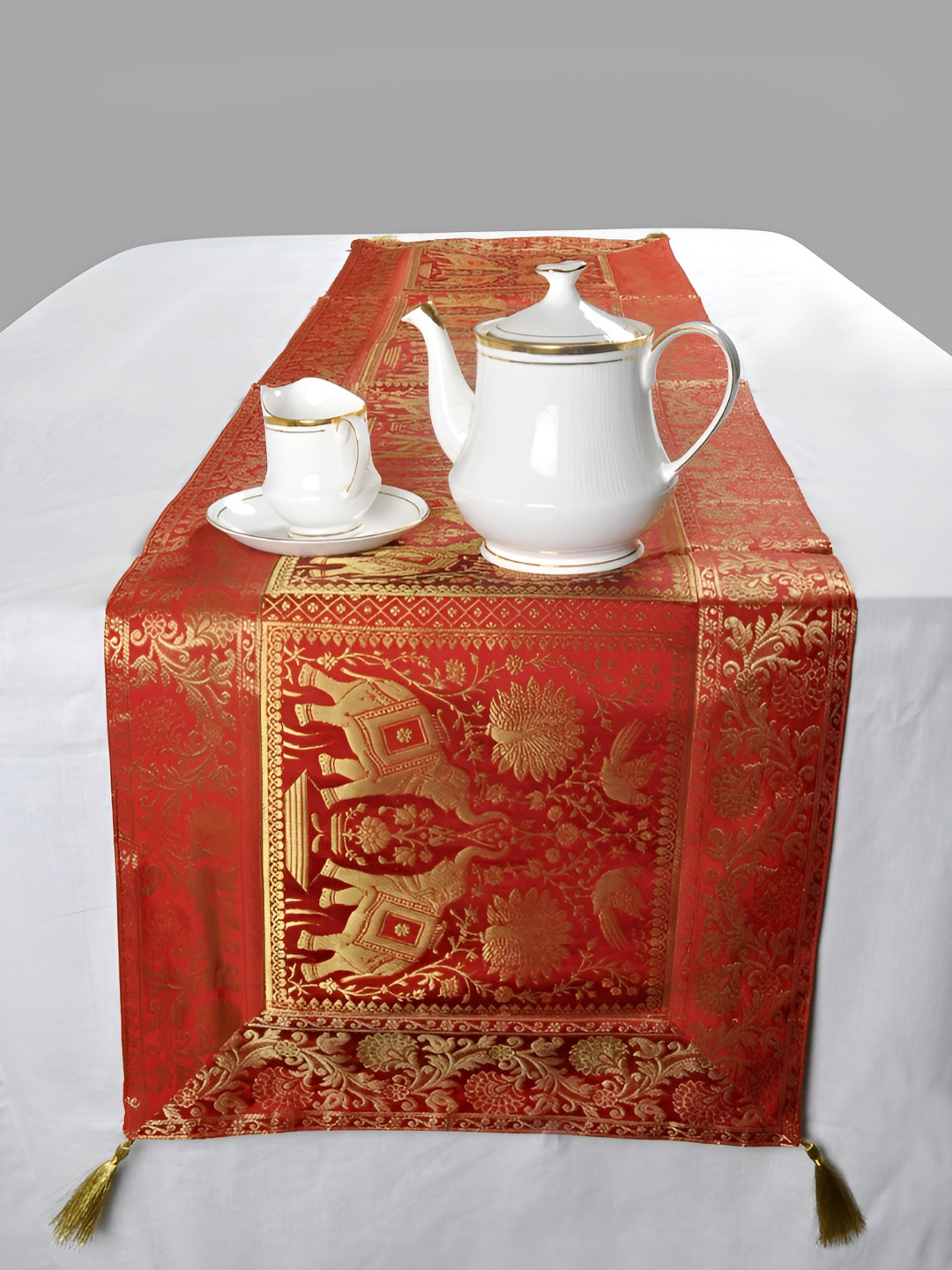

Lal Haveli Red and GoldToned Ethnic Motifs Printed Table Runner