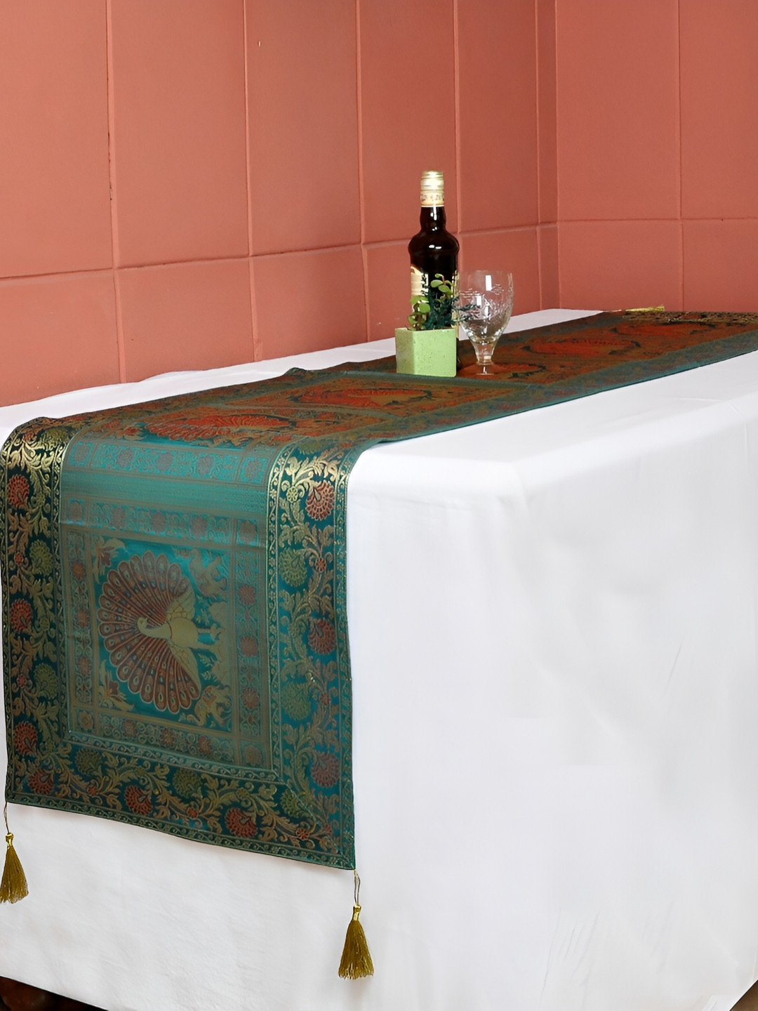 

Lal Haveli Green and GoldToned Ethnic Motifs Table Runners