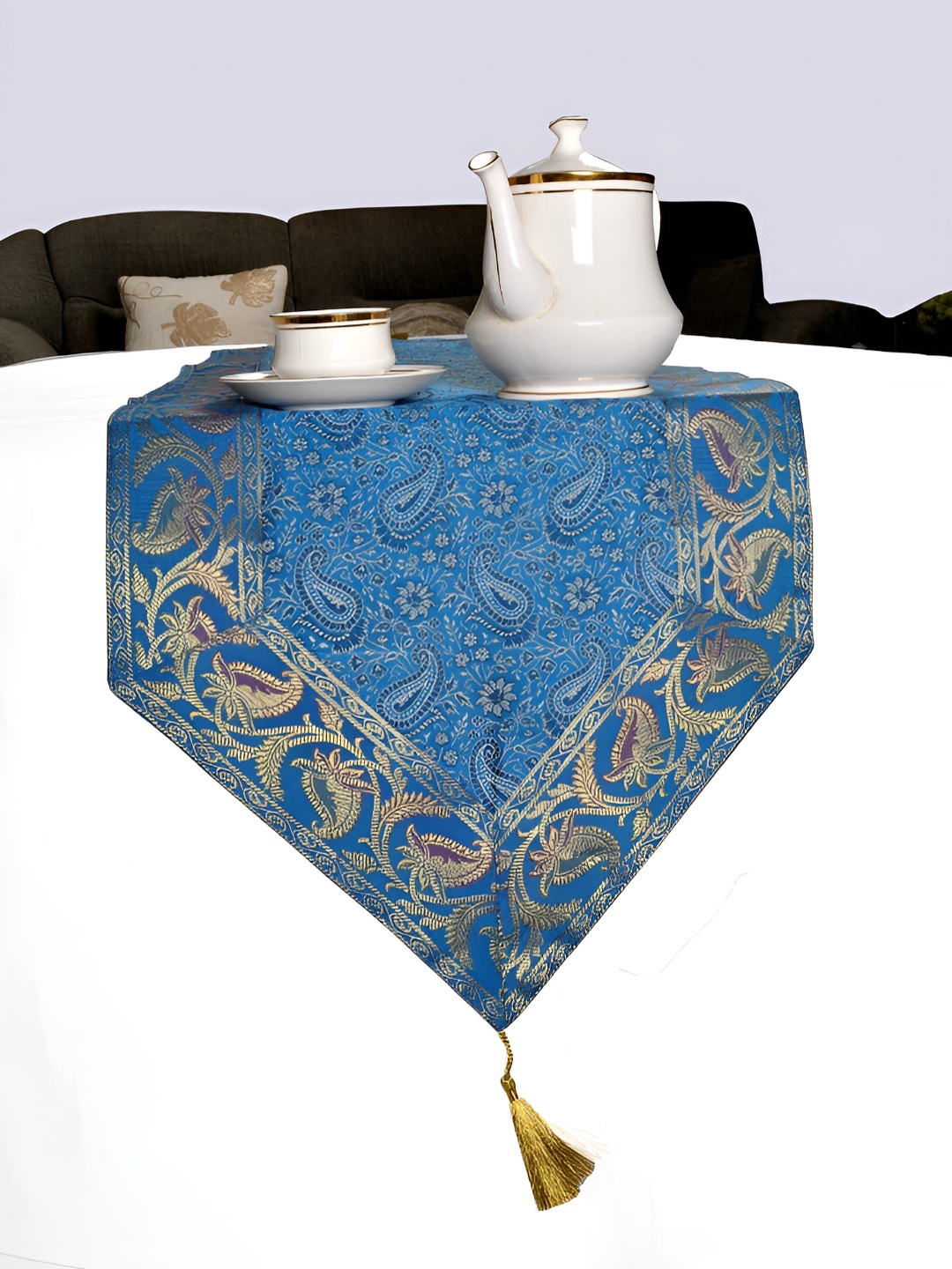 

Lal Haveli Turquoise Blue and GoldToned Ethnic Motifs Printed Table Runner