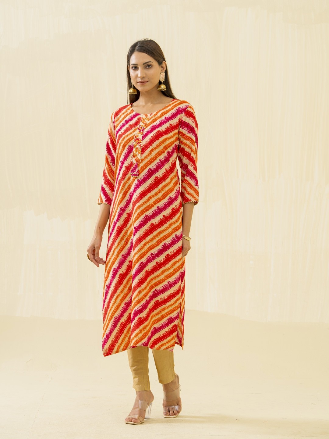 

Ode by House of Pataudi Orange Striped Round Neck Gotta Patti Straight Kurta