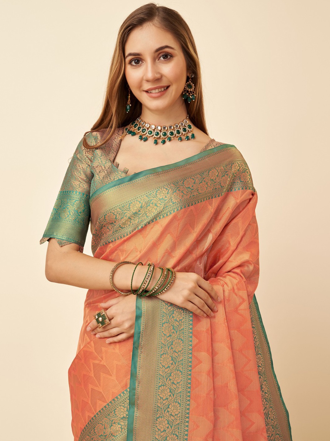 

Mitera Ethnic Motifs Woven Design Zari Organza Saree, Orange
