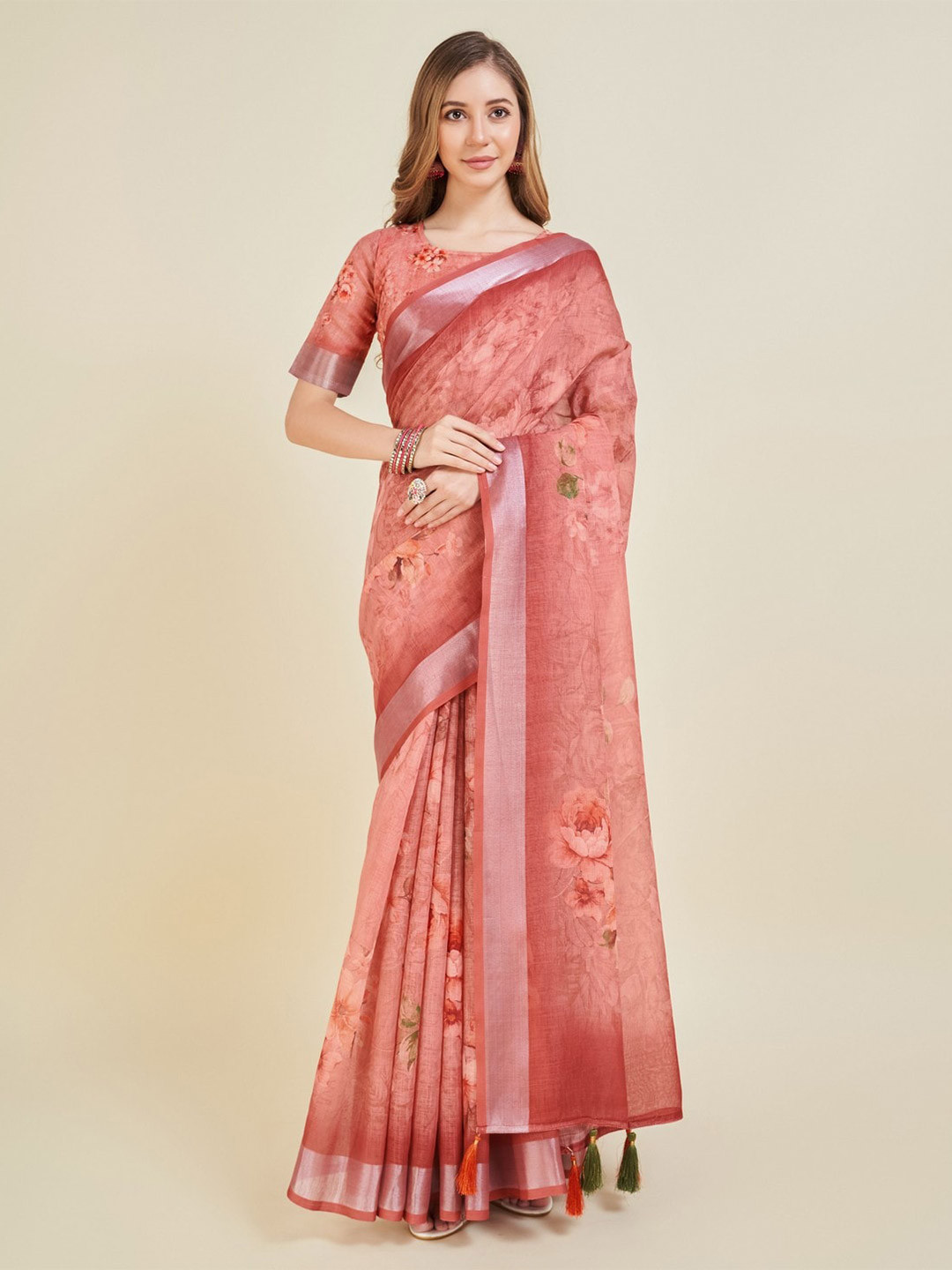 

Mitera Orange & Silver toned Floral Saree