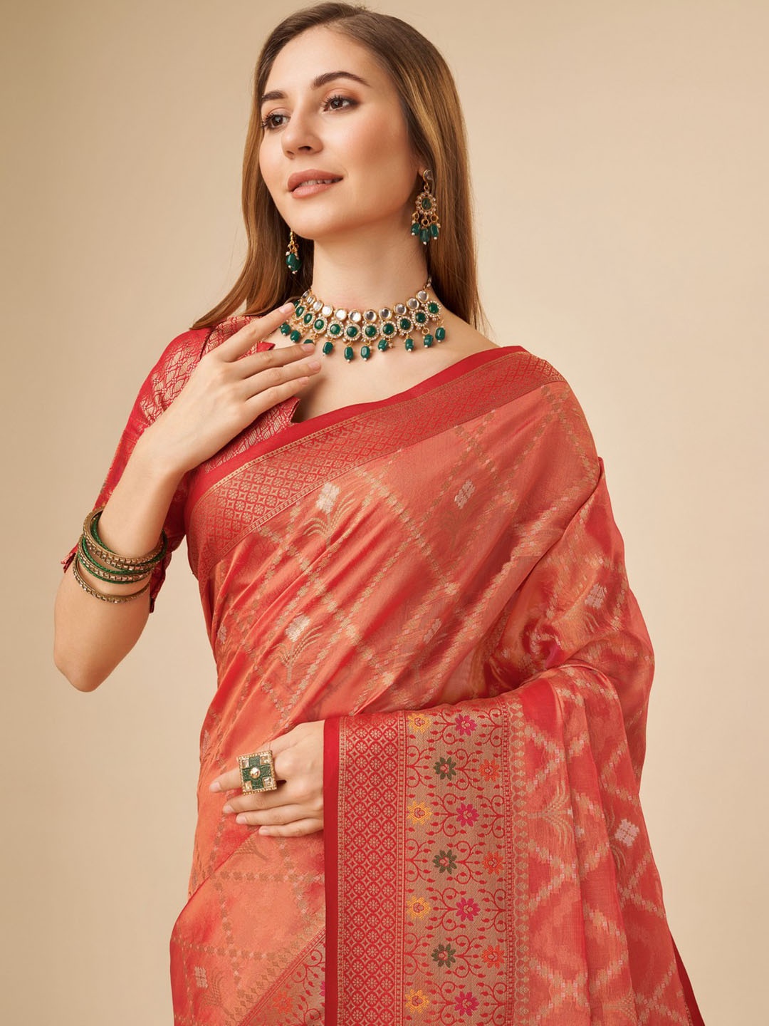 

Mitera Orange Woven Design Zari Organza Saree