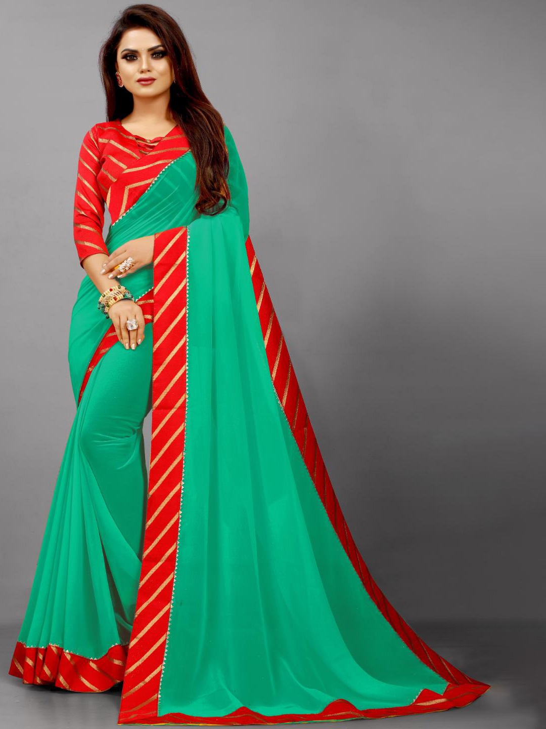 

SM TRENDZ Striped Printed Pure Georgette Saree, Sea green
