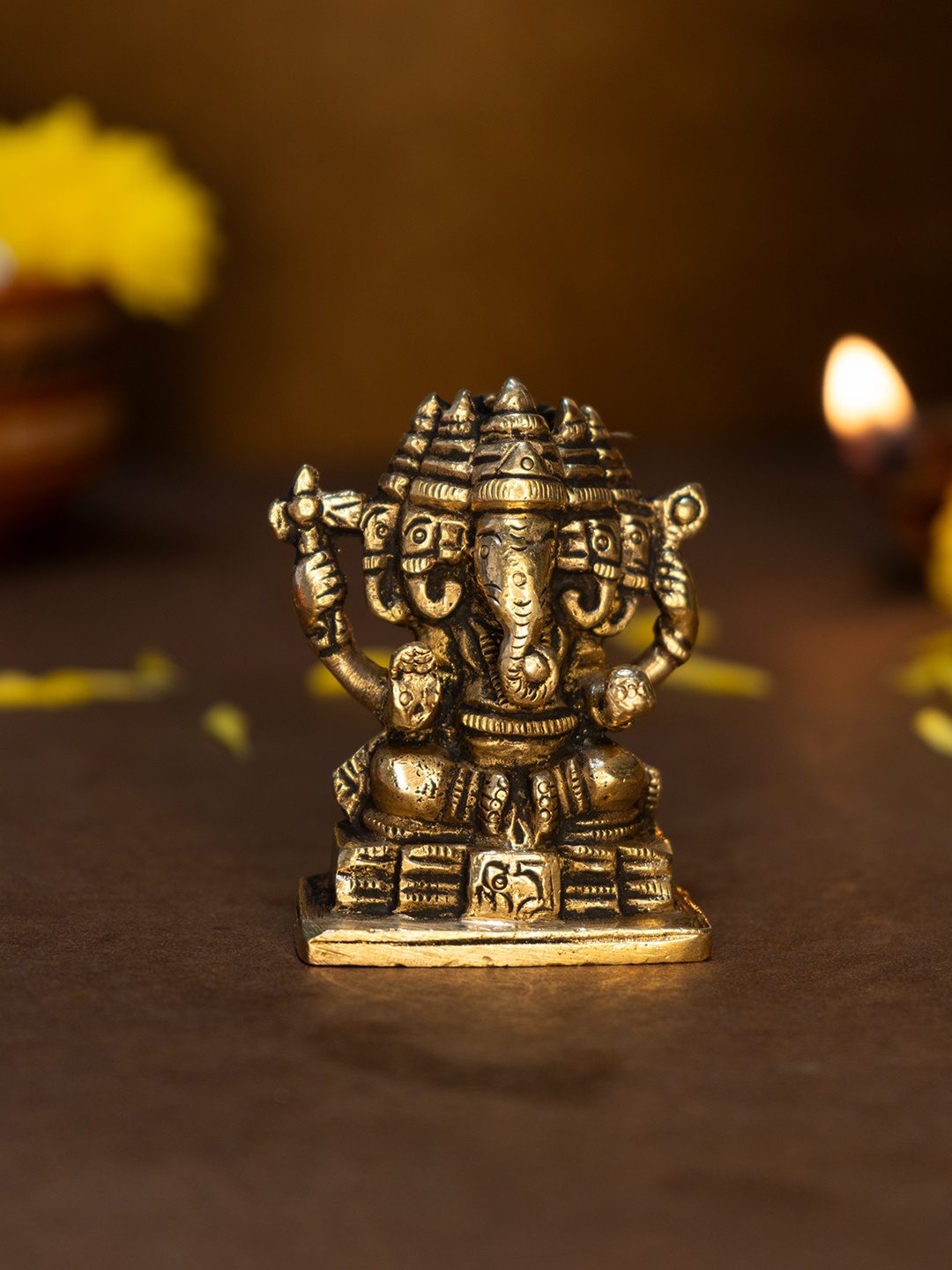 

Ekhasa Gold-Toned Panchamukhi Ganesh Idol Ganesha Showpiece