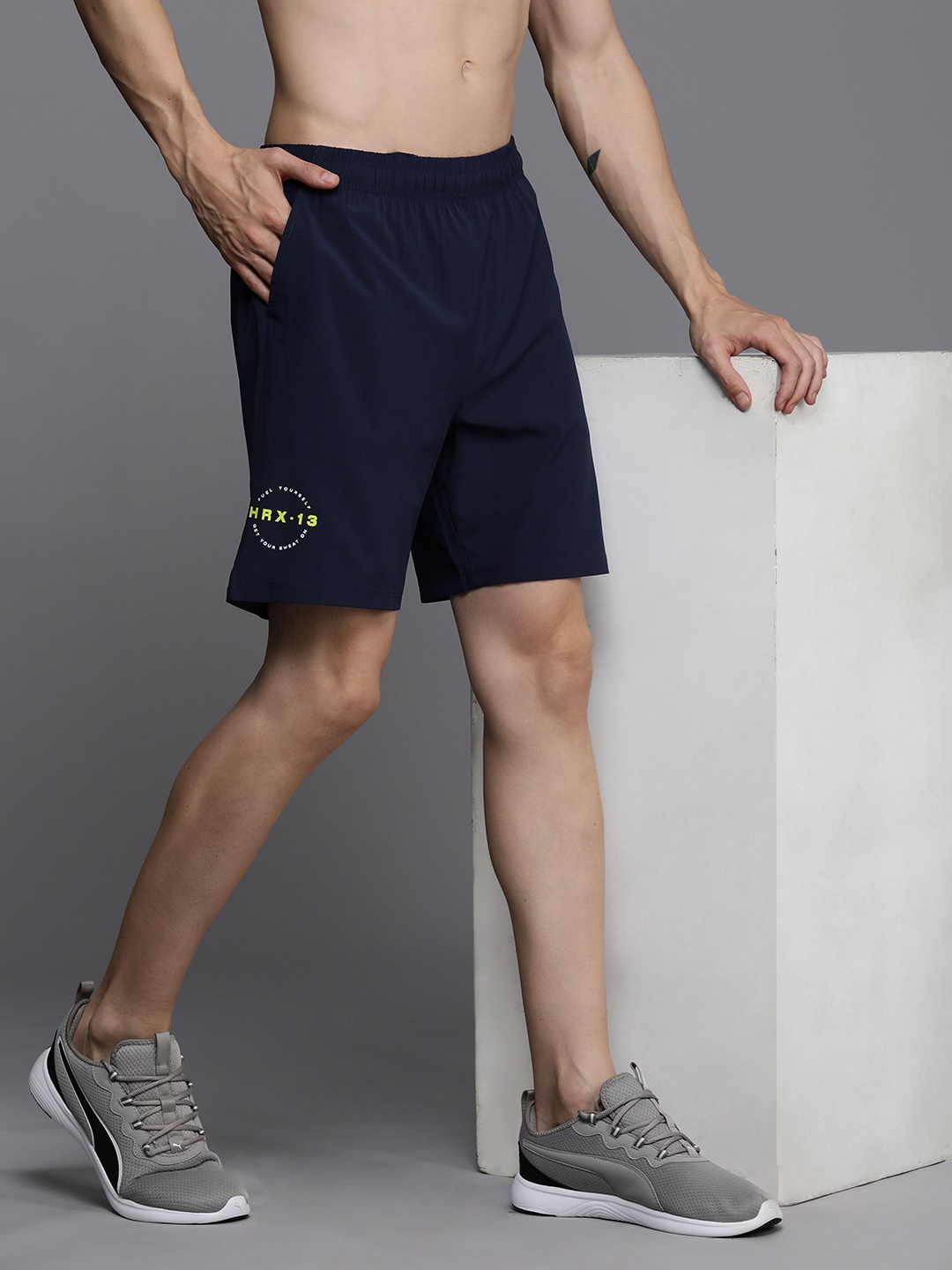 

HRX by Hrithik Roshan Men Rapid Dry Antimicrobial Finish Mid-Rise Training Shorts, Navy blue