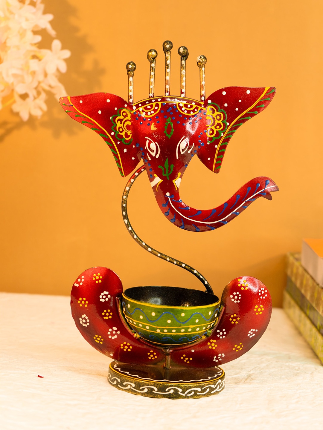 

Ekhasa Red Metal Handpainted Ganesh Tealight Candle Holder